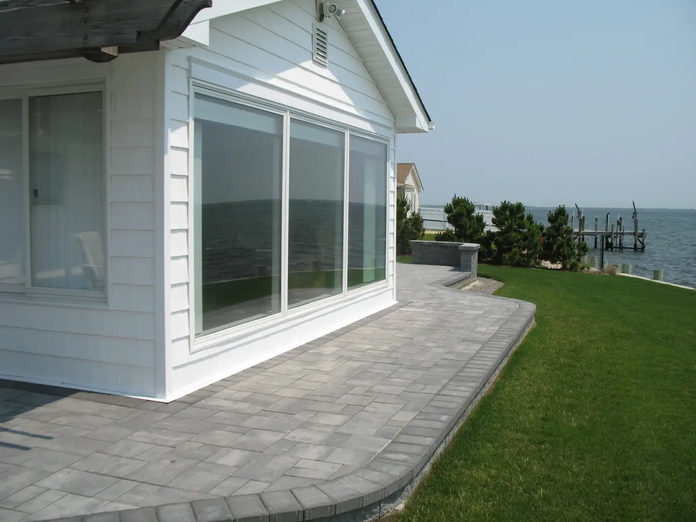 Estate poolscape — travertine pavers
